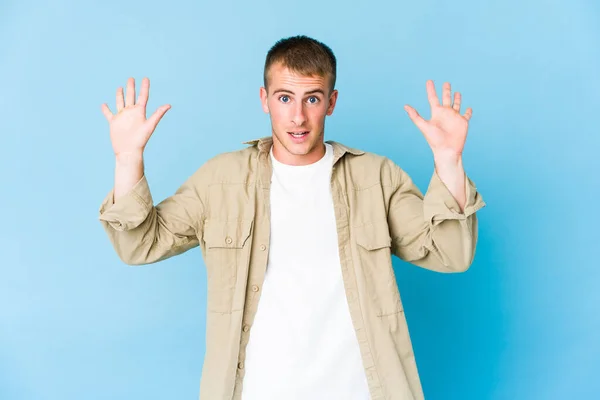 Young Caucasian Handsome Man Receiving Pleasant Surprise Excited Raising Hands — Stock Photo, Image