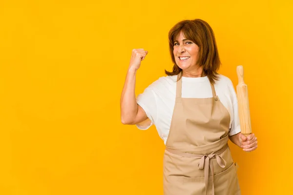 Middle Age Caucasian Cook Woman Holding Roller Isolated Raising Fist — Fotografia de Stock