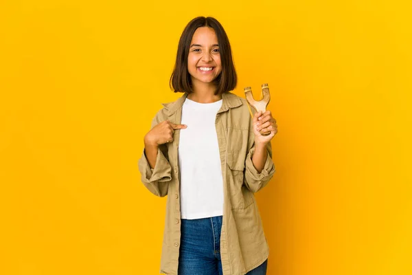 Young Hispanic Woman Holding Slingshot Person Pointing Hand Shirt Copy — Stock fotografie