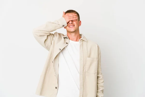 Young Caucasian Handsome Man Covers Eyes Hands Smiles Broadly Waiting — Stock Photo, Image