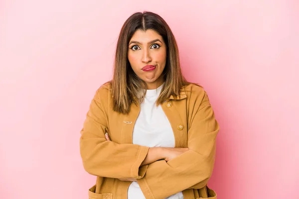 Young Indian Woman Isolated Pink Background Blows Cheeks Has Tired — Stock Photo, Image