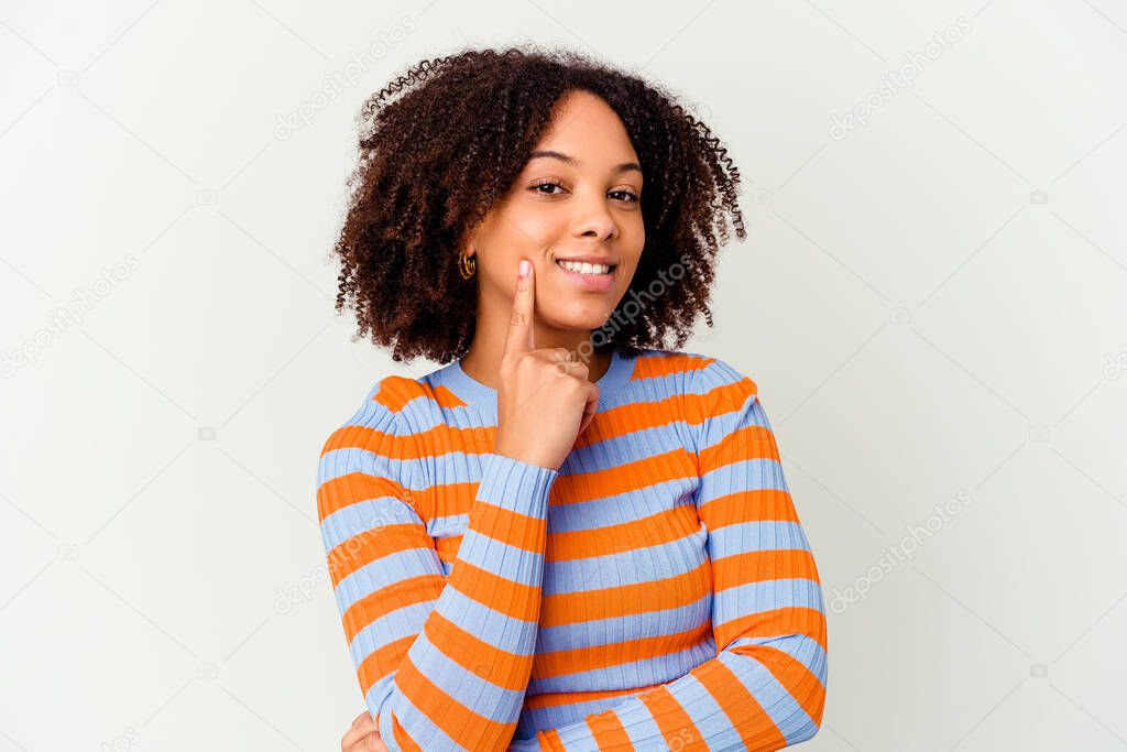 Young african american mixed race woman isolated smiling happy and confident, touching chin with hand.