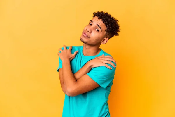 Young African American Curly Man Isolated Purple Hugs Smiling Carefree — Stock Photo, Image