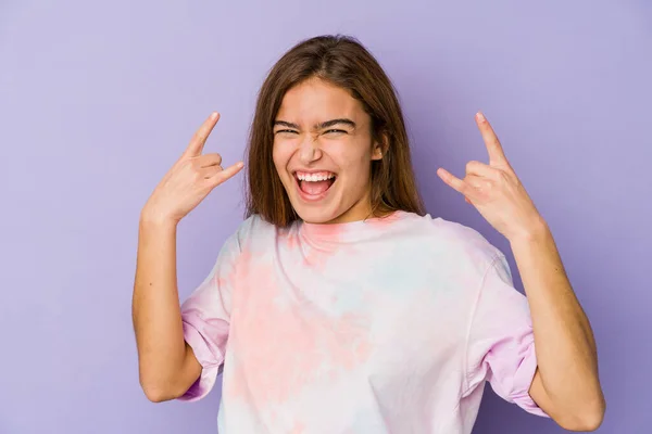 Young Skinny Caucasian Girl Teenager Purple Background Showing Horns Gesture — Stock Photo, Image