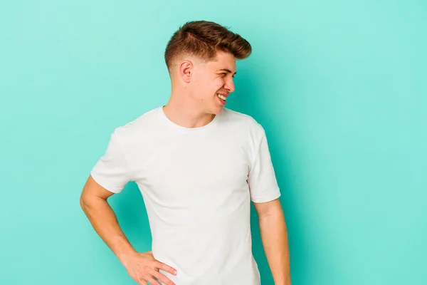 Young Caucasian Man Isolated Blue Background Laughs Closes Eyes Feels — Stock Photo, Image