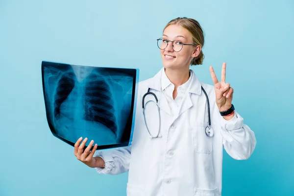 Young Russian Doctor Woman Holding Bone Scan Blue Showing Victory — Stock Photo, Image