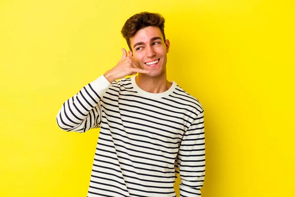 stock image Young caucasian man posing on color background 