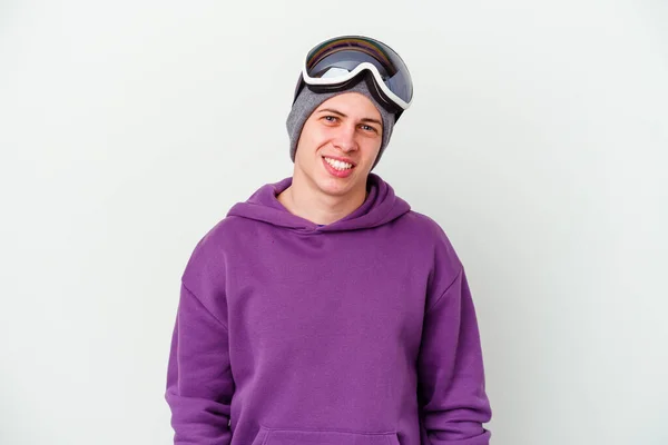 Νεαρός Άνδρας Που Κρατά Μια Snowboard Απομονωμένη Λευκό Φόντο Χαρούμενος — Φωτογραφία Αρχείου