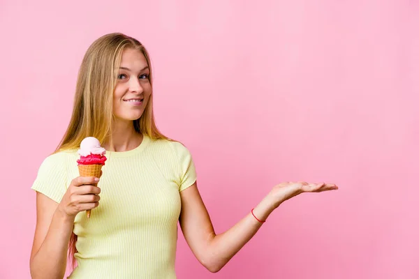 Young Russian Woman Eating Ice Cream Isolated Holding Copy Space — Stock Photo, Image