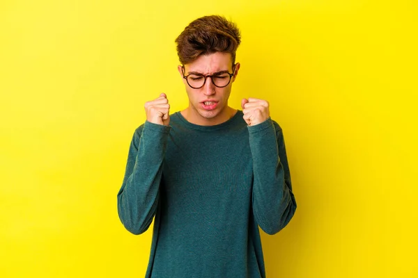 Young Caucasian Man Isolated Yellow Background Showing Fist Camera Aggressive — Stock Photo, Image