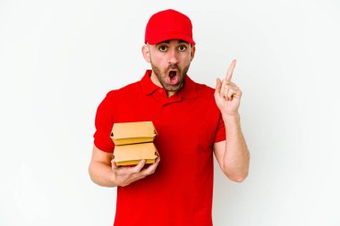 Beyaz arka planda izole genç beyaz kurye bir fikir, ilham konsepti var.