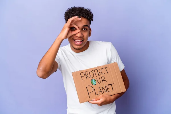 Young African American Curly Man Isolated Holding Protect Our Planet — Stock Photo, Image