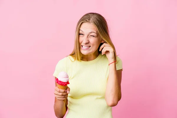 Young Russian Woman Eating Ice Cream Isolated Covering Ears Hands — Stock Photo, Image