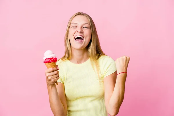 Young Russian Woman Eating Ice Cream Isolated Cheering Carefree Excited — Stock Photo, Image