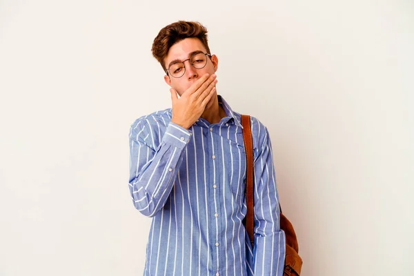 Joven Estudiante Aislado Sobre Fondo Blanco Bostezando Mostrando Gesto Cansado — Foto de Stock