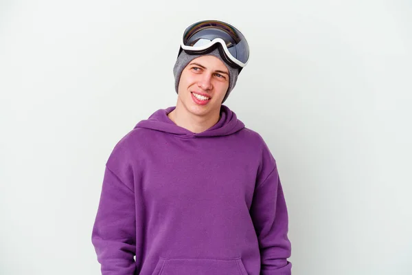 Jovem Segurando Snowboard Isolado Fundo Branco Olha Para Lado Sorridente — Fotografia de Stock