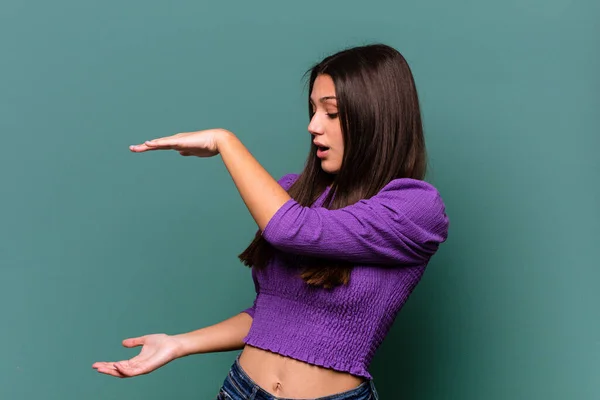 Young Indian Woman Isolated Blue Background Shocked Amazed Holding Copy — Stock Photo, Image