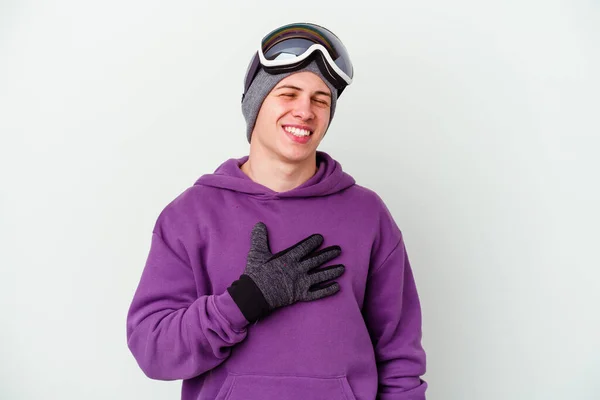 Młody Człowiek Trzymając Deskę Snowboardową Białym Tle Śmieje Się Głośno — Zdjęcie stockowe