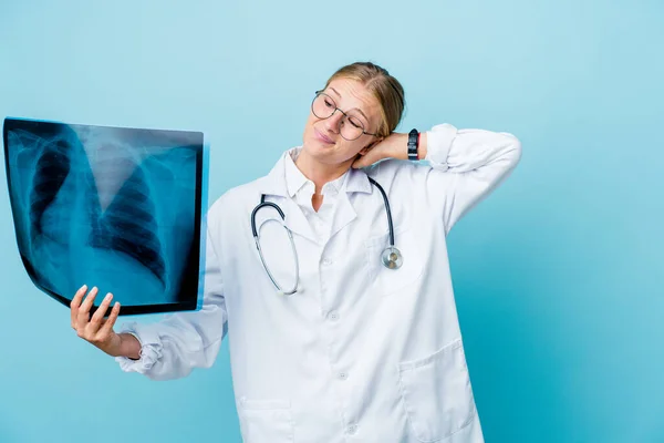 Young Russian Doctor Woman Holding Bone Scan Blue Touching Back — Stock Photo, Image