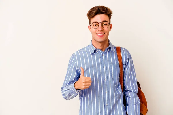 Joven Estudiante Aislado Sobre Fondo Blanco Sonriendo Levantando Pulgar Hacia — Foto de Stock