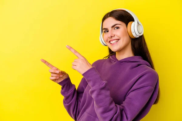 Young Caucasian Woman Listening Music Headphones Isolated Pink Background Excited — Stock Photo, Image