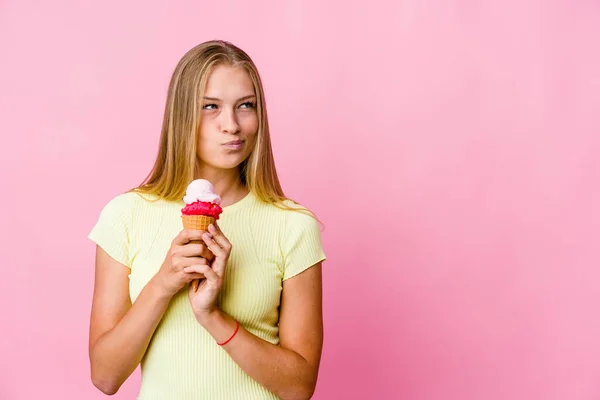 Young Russian Woman Eating Ice Cream Isolated Making Plan Mind — Stock Photo, Image