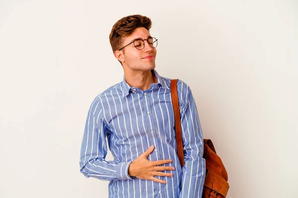 Young Student Man Isolated White Background Touches Tummy Smiles Gently — Stock Photo, Image