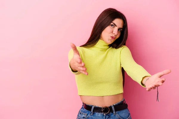 Young Caucasian Woman Isolated Pink Background Folding Lips Holding Palms — Stock Photo, Image