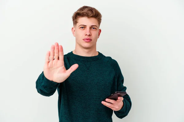 Νεαρός Καυκάσιος Ξανθός Άντρας Που Χρησιμοποιεί Ένα Τηλέφωνο Απομονωμένο Λευκό — Φωτογραφία Αρχείου