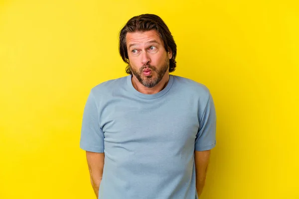 Middle Age Caucasian Man Isolated Yellow Background Shrugs Shoulders Open — Stock Photo, Image