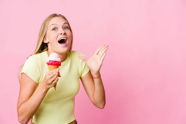 Young Russian Woman Eating Ice Cream Isolated Shouts Loud Keeps — Stock Photo, Image