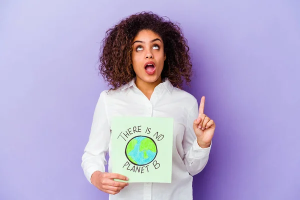 Young African American Woman Holding Planet Placard Isolated Pointing Upside — Stock Photo, Image