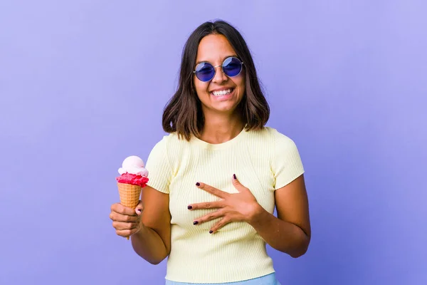 Young Mixed Race Woman Eating Ice Cream Laughs Happily Has — 图库照片