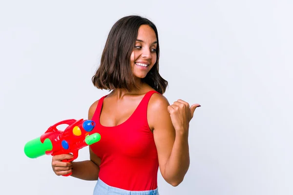 Young Mixed Race Woman Holding Water Gun Isolated Points Thumb — 图库照片