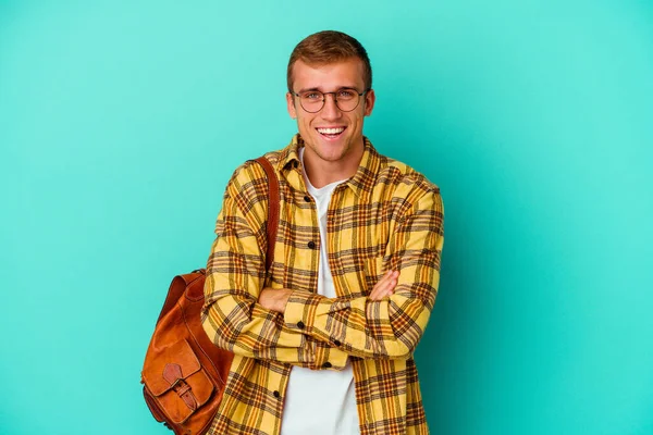 Joven Caucásico Estudiante Hombre Aislado Azul Fondo Riendo Divertirse —  Fotos de Stock