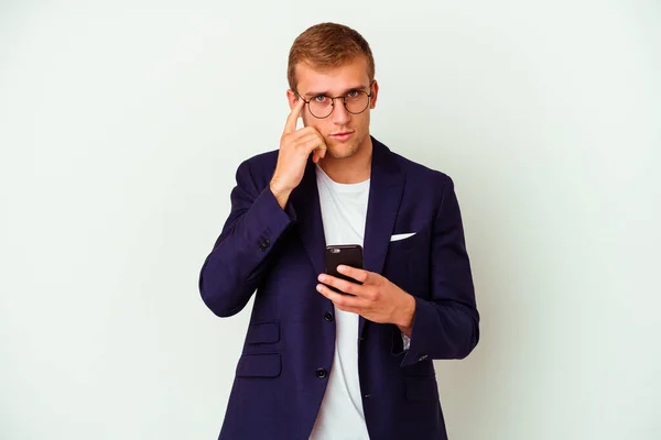 Jovem Homem Negócios Segurando Telefone Celular Isolado Fundo Branco Apontando — Fotografia de Stock