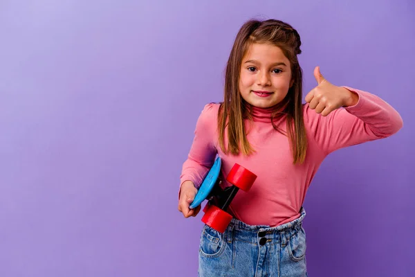 Little Skater Caucasian Girl Isolated Blue Background Smiling Raising Thumb — Stock Photo, Image