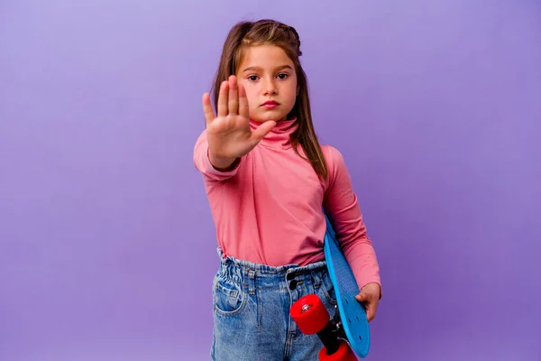 Little Skater Caucasian Girl Isolated Blue Background Standing Outstretched Hand — Stock Photo, Image