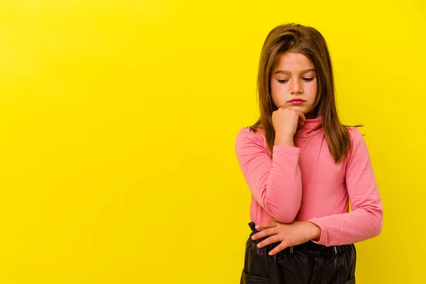 Little Caucasian Girl Isolated Yellow Background Looking Sideways Doubtful Skeptical — Stock Photo, Image