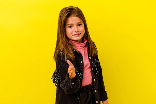 Little Caucasian Girl Isolated Yellow Background Stretching Hand Camera Greeting — Stock Photo, Image