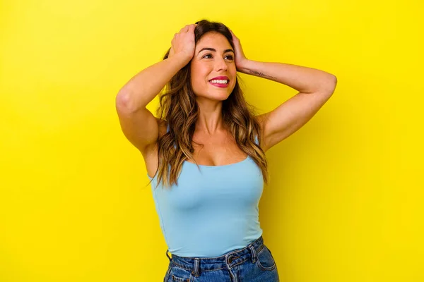 Young Caucasian Woman Isolated Yellow Background Laughs Joyfully Keeping Hands — Stock Photo, Image