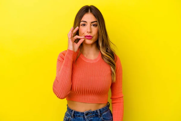 Young Caucasian Woman Isolated Yellow Background Fingers Lips Keeping Secret — Stock Photo, Image