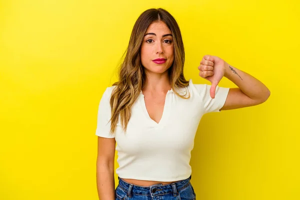 Young Caucasian Woman Isolated Yellow Background Showing Thumb Disappointment Concept — Stock Photo, Image