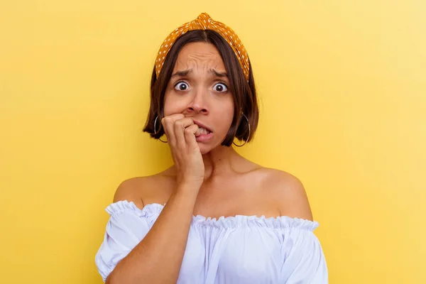 Young Mixed Race Woman Isolated Yellow Background Biting Fingernails Nervous — Stock Photo, Image