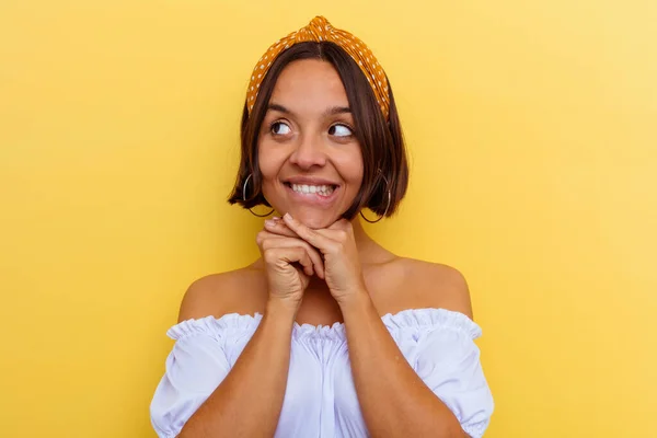 Young Mixed Race Woman Isolated Yellow Background Keeps Hands Chin — Stock Photo, Image