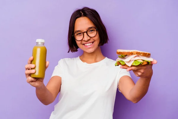 Young Mixed Race Woman Holding Healthy Smoothie Sandwich Isolated Purple — Stock Photo, Image