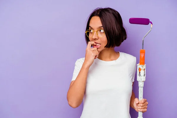 Young Painter Mixed Race Woman Holding Paint Stick Isolated Purple — Stock Photo, Image