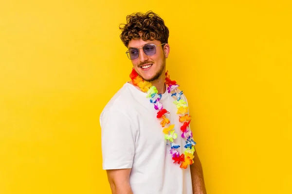 Young Caucasian Man Wearing Hawaiian Party Stuff Isolated Yellow Background — Stock Photo, Image