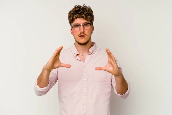 Young Caucasian Man Isolated White Background Holding Something Palms Offering — Stock Photo, Image