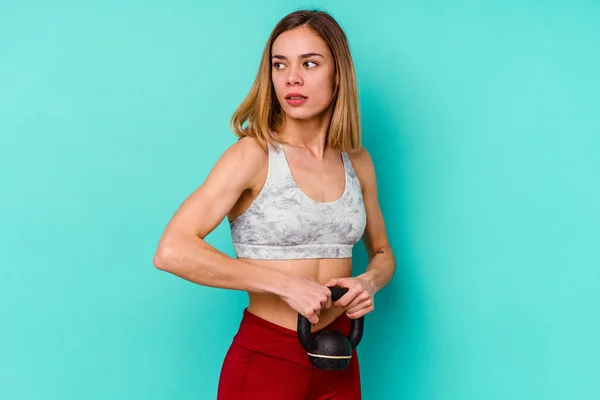 Young Sport Skinny Caucasian Holding Dumbbell Woman Isolated Blue Background — Stock Photo, Image